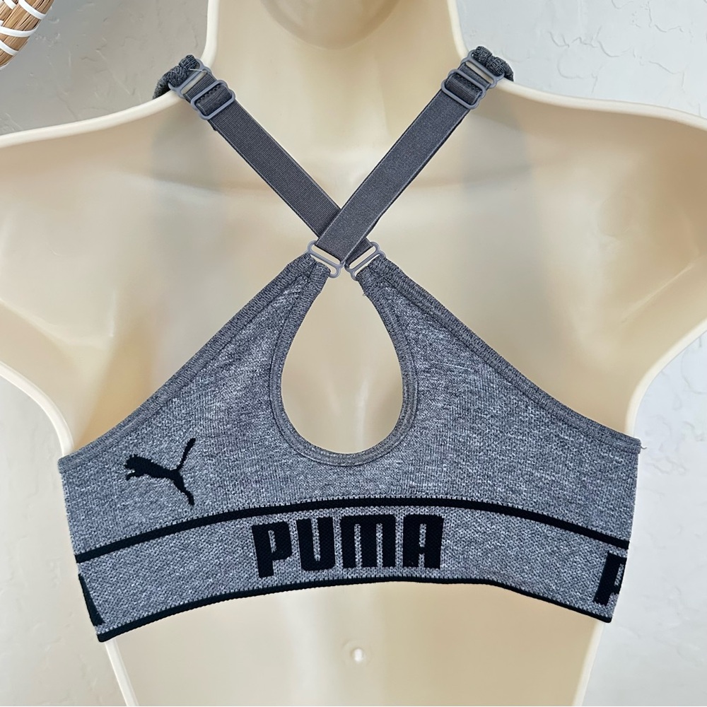 PUMA Charcoal Gray Sports Bra with adjustable straps.